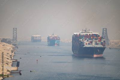 A view of typical Suez Canal Shipping traffic. (c) AdobeStock / Hladchenko Viktor