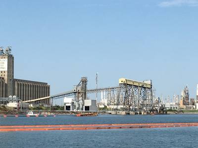 Absorbent boom surrounds the dredge vessel Waymon L Boyd in the Port of Corpus Christi Ship Channel, Saturday. (Photo: U.S. Coast Guard)