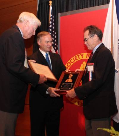 American Society of Naval Engineers (ASNE) President Ronald Kiss (left) and U.S. Rep. Randy Forbes (Va.) present the Frank C. Jones Award to Bill Clifford (right), president of BAE Systems Ship Repair, at the Fleet Maintenance and Modernization Symposium in Virginia Beach. The award, presented annually by the ASNE, recognizes leaders in naval engineering who have contributed to ship maintenance and alteration programs for naval vessels.