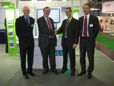 Dr Andrew Garrad (left), with GL Garrad Hassan Senior Vice Presidents Dr Lars Landberg (far left) and Dr Tim Camp (far right), congratulate the winner of the award, Dr Iñigo Martínez de Alegría. Photo: GL Group