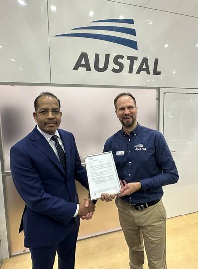 Antony M DSouza, President and Director Southeast Asia, Pacific and Indian Subcontinent, DNV and Sam Abbott, Head of Research and Development at Austal celebrate the Approval in Principle for the AROS Controller at INDO PACIFIC 2025. (image: Austal)