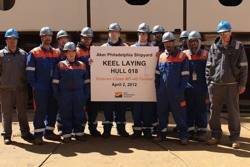 Apprentices, officials at ceremony: Photo credit Aker