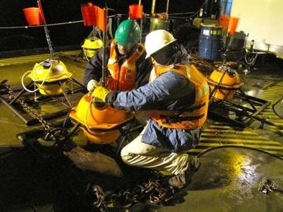 Preparation of Ocean-bottom Seismometer: Photo credit USCG