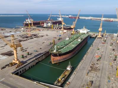 Asyad Dry Dock in Duqm, Oman, was previously Oman Drydock Company. Its new name reflects its ownership by Oman shipping and logistics group, Asyad. Image courtesy Asyad Dry Dock