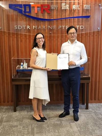 At the JDP signing which took place at SDTR's offices in Singapore: Left Cristina Saenz de Santa Maria, Regional Manager South East Asia, Pacific & India, DNV Maritime, Right Gao Dehui, CEO of SDTR Marine Pte Ltd. (Photo: DNV)