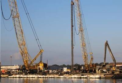 Augers drill 110-foot long holes to house concrete piles as part of the launch way 
upgrade project at Halter Marine. (Photo: Halter Marine)