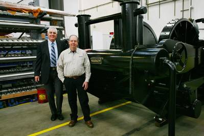 Blaine Dempke (L) and LeCoque started working with Markey as teenagers and rose through the engineering department and machine shop ranks. They took over management of the company in 1996 and bought out the Markey family in 1999.Photo courtesy Markey Machinery