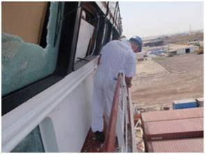 Bridge window cracked / shattered and bullethole damage (photo courtesy Helix Media)