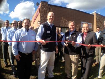 Caption  Ribbon cutting (l-r): Norm Gadomski, Service OEM Technician, Patrick McGovern, COO, Steve McGovern, President, Ian Abreu, New Bedford Chamber of Commerce