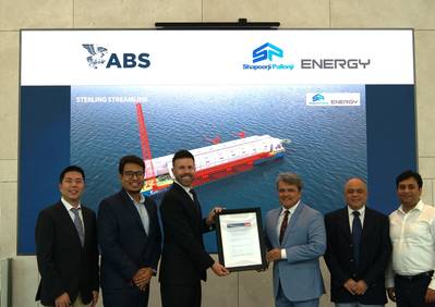 Center, left to right: Ben Ford, ABS Director, Business Development, and Ankit Garg, President Projects, SPE, hold the ABS AIP certificate. (Photo: ABS)