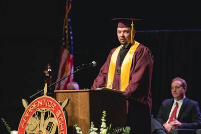 Chris Rose (Homer L. Ferguson Award Recipient) speaking during the 2022 Apprentice School Commencement ceremony held March 12, 2022.  (Photo: Ashley Cowan / HII)