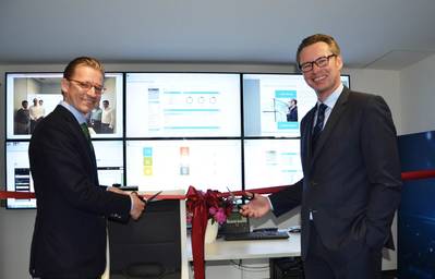 Christian Rychly, Managing Director of Leonhardt & Blumberg (left) and Knut Ørbeck-Nilssen, CEO of DNV GL – Maritime (right) cut the ribbon. (Photo: DNV GL)