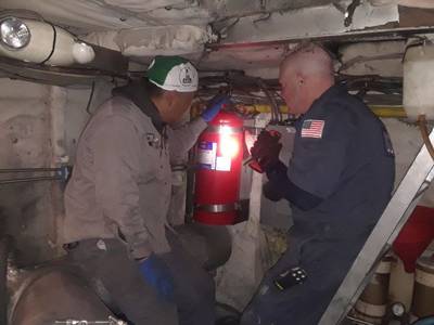 Coast Guard Chief Warrant Officer John Bafia inspects a New York Waterway vessel with the help of a crew member November 23, 2019. The Coast Guard inspected all of New York Waterway's operational ferries in less than two weeks. (Photo by Petty Officer 3rd Class John Hightowe; Courtesy photo by U.S. Coast Guard)