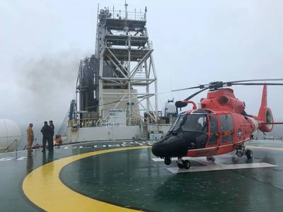 A U.S. Coast Guard Air Station New Orleans aircrew aboard the Noble Globetrotter II. (Photo: U.S. Coast Guard)