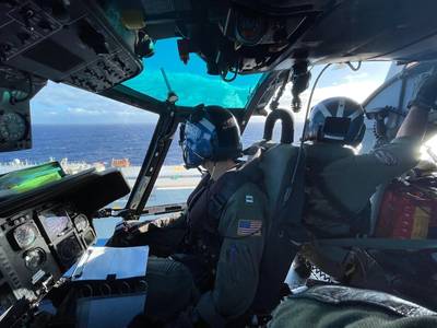 Coast Guard air crew prepare to conduct a medevac of a mariner 100 miles northwest of Oahu, December 4, 2020. (U.S. Coast Guard photo courtesy of Air Station Barbers Point)