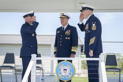 Commandant of the Coast Guard Adm. Karl Shultz presides over the Master Chief Petty Officer of the Coast Guard Change of Watch ceremony as Master Chief Heath Jones, command master chief, Deputy Commandant for Mission Support, relieves Master Chief Jason Vanderhaden, Master Chief Petty Officer of the Coast Guard. (U.S. Coast Guard photo by Petty Officer 2nd Class John Michelli)