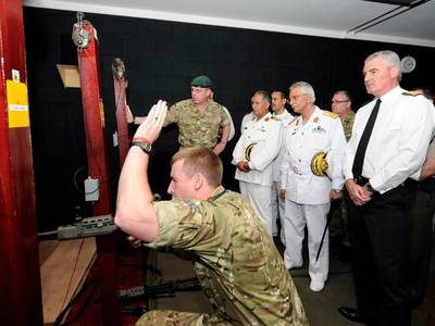 Commodore Hassan Ali Bushnak (Center) Photo credit: UK MOD