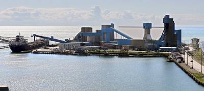 Compass Minerals transports rock salt using self-unloading vessels . Here a vessel is loaded at Compass Minerals’ Goderich, Ontario, mine. (Photo: Compass Minerals)