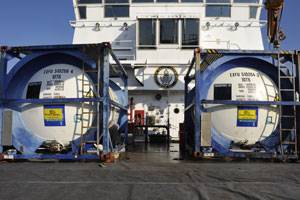 Containers filled with oil collected from the Deepwater Horizon response sit on the deck of the Coast Guard Cutter Harry Claiborne here May 23, 2010. The Harry Claiborne is able to respond to oil spills due to being equipped with a Vessel of Opportunity Skimming System. U.S. Coast Guard photo by Petty Officer 3rd Class Barry Bena. (Photo courtesy USCG)