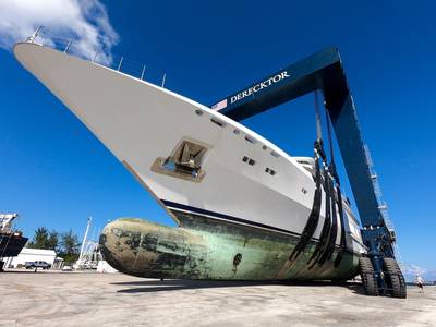 Coral Ocean is hauled out of the water for service at Derecktor Ft. Pierce. Measuring 73 meters long and weighing nearly 1,300 tons, Coral Ocean is the largest yacht ever to be hauled using strap lift technology anywhere in the world. (Photo: Derecktor Ft. Pierce)