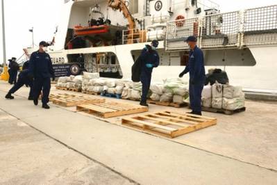 Crew members aboard the Coast Guard Cutter Vigilant stack seized cocaine at Coast Guard Base Miami Beach, Florida, June 12. On May 22, the crew of the Vigilant and the Coast Guard Cutter Bear interdicted the cocaine worth an estimated wholesale value of $10.9 million. (USCG photo by Mark Barney)