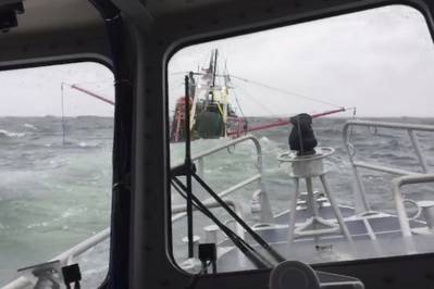 Crewmembers from Coast Guard Station New London aboard a 45-foot Response Boat-Medium approach a 55-foot fishing vessel taking on water near Fishers Island, New York, Sunday March 10, 2019. The individuals were picked up within one minute of abandoning ship. (Photo by Petty Officer 3rd Class Steven Strohmaier, courtesy of Station New London)