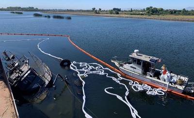 Crews work to place and maintain sorbent boom around the Tug Mazapeta on September 7, 2023. Image credit: California Department of Fish & Wildlife’s Office of Spill Prevention & Response.