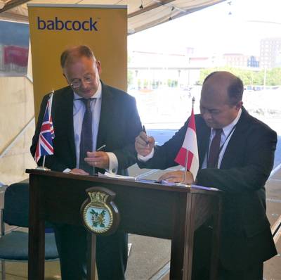 David Lockwood Babcock CEO (L) and Kaharuddin Djenod, (R) CEO  PAL sign contract on board HMS Argyll (Photo: Babcock)