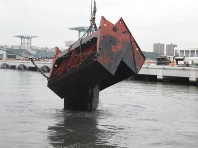 Donjon Marine dredges New York Harbor for the return and  re-entry of the USS Intrepid, a museum and educational center.
