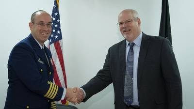 Dr. Joel Mozer, Space Force Director of Science, Technology and Research, and U.S. Coast Guard Capt. Dan Keane, Coast Guard Research and Development Center commanding officer, sign a MOU to enhance space-related capabilities for the joint warfighter. (Photo: Stuart Bright / U.S. Air Force)