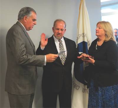 Dr. Sulzer being sworn in by Secretary LaHood.