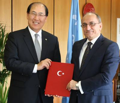 Abdurrahman Bilgiç, Ambassador and Permanent Representative of Turkey to IMO, deposited Turkey’s instrument of accession with Secretary-General Kitack Lim. (Photo: IMO)