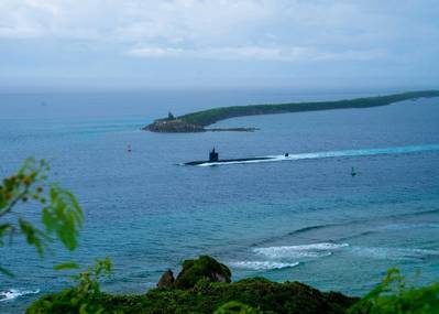 The Los Angeles-class fast-attack submarine USS Springfield (SSN 761) departs Apra Harbor, Guam, Oct. 5. Springfield is one of five submarines assigned to Commander, Submarine Squadron (SUBRON) 15. SUBRON 15 is responsible for providing training, material, and personnel readiness support to five forward-deployed Los Angeles-class fast-attack submarines and is located at Polaris Point, Naval Base Guam. (U.S. Navy photo by Lt. Eric Uhden)