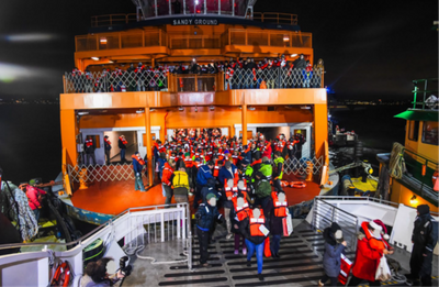 Evacuation of passengers from the Sandy Ground to a responding vessel. (Source: NYCDOT Ferry Division)