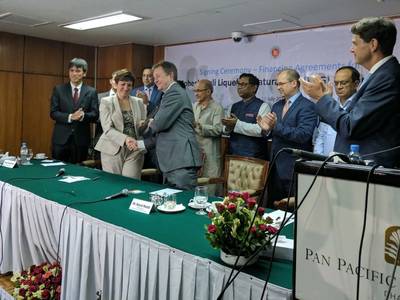 Excelerate CFO Nick Bedford and representatives from IFC, the Bangladeshi government, Petrobangla, and project lenders at the signing ceremony in Dhaka in the summer of 2017. IFC, a member of the World Bank Group, and Excelerate Energy Bangladesh Limited (Excelerate) are co-developing the Moheshkhali Floating LNG project – Bangladesh’s first liquefied natural gas (LNG) import terminal. (Image: Excelerate)