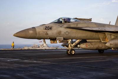 An F/A-18E Super Hornet, attached to Strike Fighter Squadron (VFA) 14, taxis on the flight deck of Nimitz-class aircraft carrier USS Abraham Lincoln (CVN 72), April 16, 2026. Abraham Lincoln is deployed to the U.S. 5th Fleet area of operations to support maritime security and stability in the Middle East. (U.S. Navy photo)