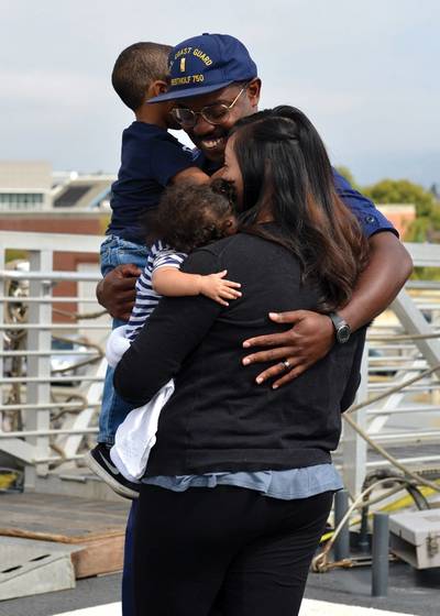 Family and friends met aboard the Coast Guard Cutter Bertholf's flight deck to reunite with Bertholf crewmembers following the cutter's return home to Alameda, Calif., after a 90-day deployment, Sept. 4, 2018. Bertholf is one of four 418-foot National Security Cutters homeported in Alameda. U.S. Coast Guard photo by Petty  Family and friends met aboard the Coast Guard Cutter Bertholf's flight deck to reunite with Bertholf crewmembers following the cutter's return home to Alameda, Calif., after a