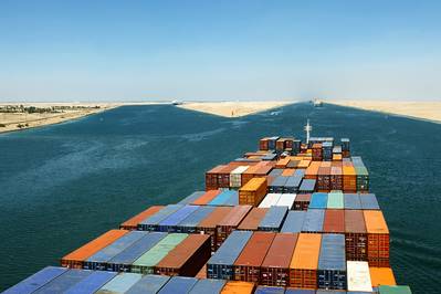 file Image: A boxship transits the Suez Canal (CREDIT: AdobeStock / © Andriy Kovach
