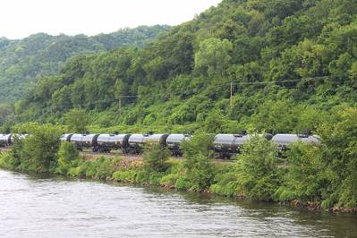File Image: A typical Crude Oil train in the United states makes its way south along inalnd waterways. CREDIT: Dagmar Etkin