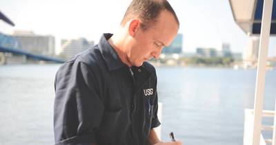 File Image: A USCG safety inspector at work on the waterfront. CREDIT USCG / Anthony Soto