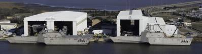 File Photo: LCS hulls 4 & 6 alongside the pier at Austal Shipyard..