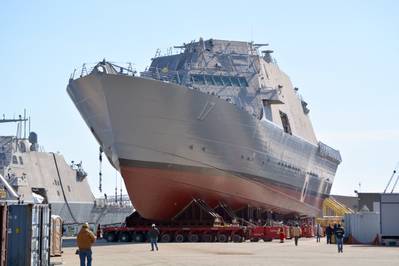 File photo: Littoral combat ship USS Indianapolis (LCS 17) is moved from an indoor production facility in Marinette, Wisc., to launchways in preparation for its upcoming launch into the Menomenee River. (U.S. Navy photo courtesy of Fincantieri Marinette Marine by Val Ihde)