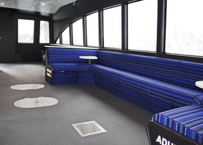 Flush mounted watertight hatches and deck drains promote accessibility and can be submitted to the Coast Guard as an alternative to six-inch door coamings. (Image courtesy All American Marine)