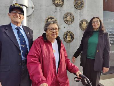 From left, retired Merchant Marine chief engineer Byron "Andy" Anderson, Anacortes resident Elsie Bowers, and Xochitl Castaneda of the U.S. Maritime Administration participated in the Nov. 10  unveiling of the U.S. Merchant Marine plaque at  Veterans Memorial Plaza in Anacortes, Washington. Bowers's late husband, Harlan, was a Merchant Marine able seaman during World War II and saw action in the South Pacific. (Photo: Richard Walker)