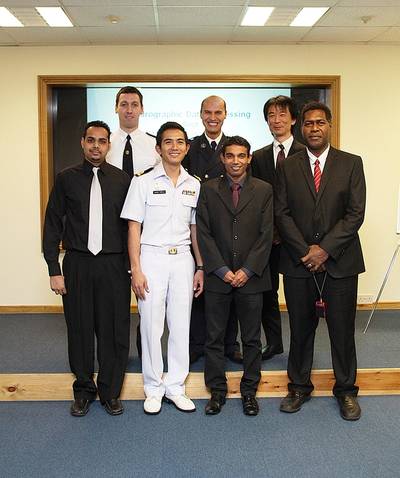 From left to right, back row: Nikolay Radoslavov Lyaskovski (Bulgaria); Mohamed Zabour (Algeria) and Yusuke Nagase (Japan). Front row: Dwight Nanan (Trinidad & Tobago); Sub Lt Uaychai Phothong (Thailand); Rahubadda Kankanamge Anura Ariyarathna (Sri Lanka) and John Dalomae (Solomon Islands).