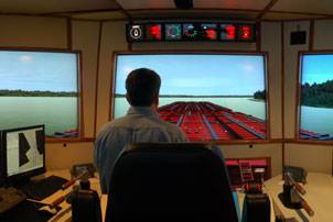 The full-mission, full-bridge towboat wheelhouse simulator at Kirby’s training center (Photo courtesy Kirby Corp.)