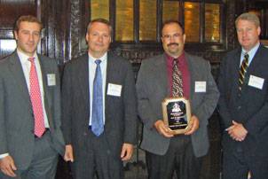 Gladding-Hearn Shipbuilding officials accept 2009 Improvement in Safety Award from the Shipbuilders Council of America in April (left to right): Ian Bennitt, SCA manager of government affairs, Peter Duclos, Gladding-Hearn president, Paul Simons, Gladding-Hearn’s safety and compliance coordinator, and Matt Paxton, SCA president. 