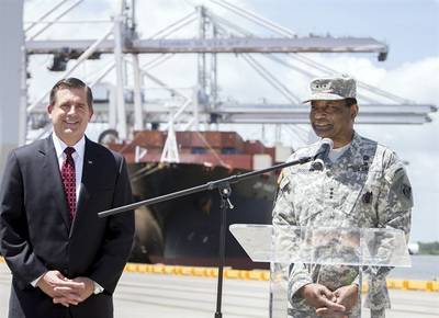 GPA Executive Director Curtis Foltz, left, and Lt. General Thomas Bostick, commander of the USACE, give an update on the Savannah Harbor Expansion Project as cranes work a vessel, Thursday, May 28, 2015, at the Garden City Terminal near Savannah, Ga. (Photo: Georgia Ports Authority/Stephen B. Morton)