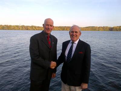 Graham Ford (left), President of the ILS and Michael Vlasto, Chairman of the IMRF (right) shake hands on their agreement.