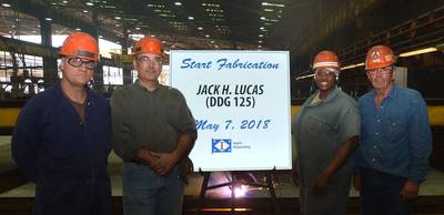 Shipbuilders in Ingalls' Steel Fabrication Shop, from left: Paul Perry, Donald Morrison, Queena Myles and Paul Bosarge celebrate the official start of fabrication for the U.S. Navy’s newest destroyer Jack H. Lucas (DDG 125) on May 7, 2018. (Photo: Shane Scara/HII)